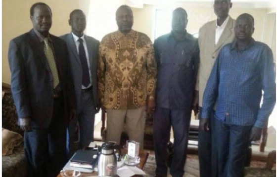 Gatluke Reat (far left) posts for a picture with SPLM/SPLA Chairman, Dr. Riek Machar Teny, in Addis Ababa, Ethiopia(Photo: supplied/Nyamilepedia)