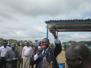 Bor town mayor, Nhial Majak, showing the money collected for development projects in the Jonglei capital, June 29, 2013..